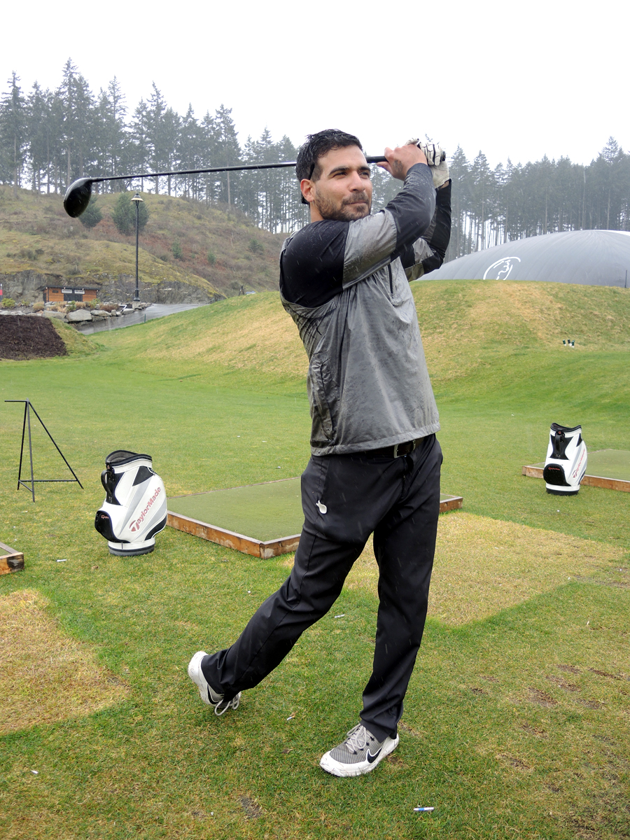 Private (Retired) Tanner Wilson gets some practice in on the driving range at Bear Mountain Golf Club during a Soldier On Golf Camp, April 2. Wilson did two tours in Afghanistan and says the sport of golf has been essential to his recovery from Post-Traumatic Stress Disorder (PTSD). Photo by Peter Mallett, Lookout