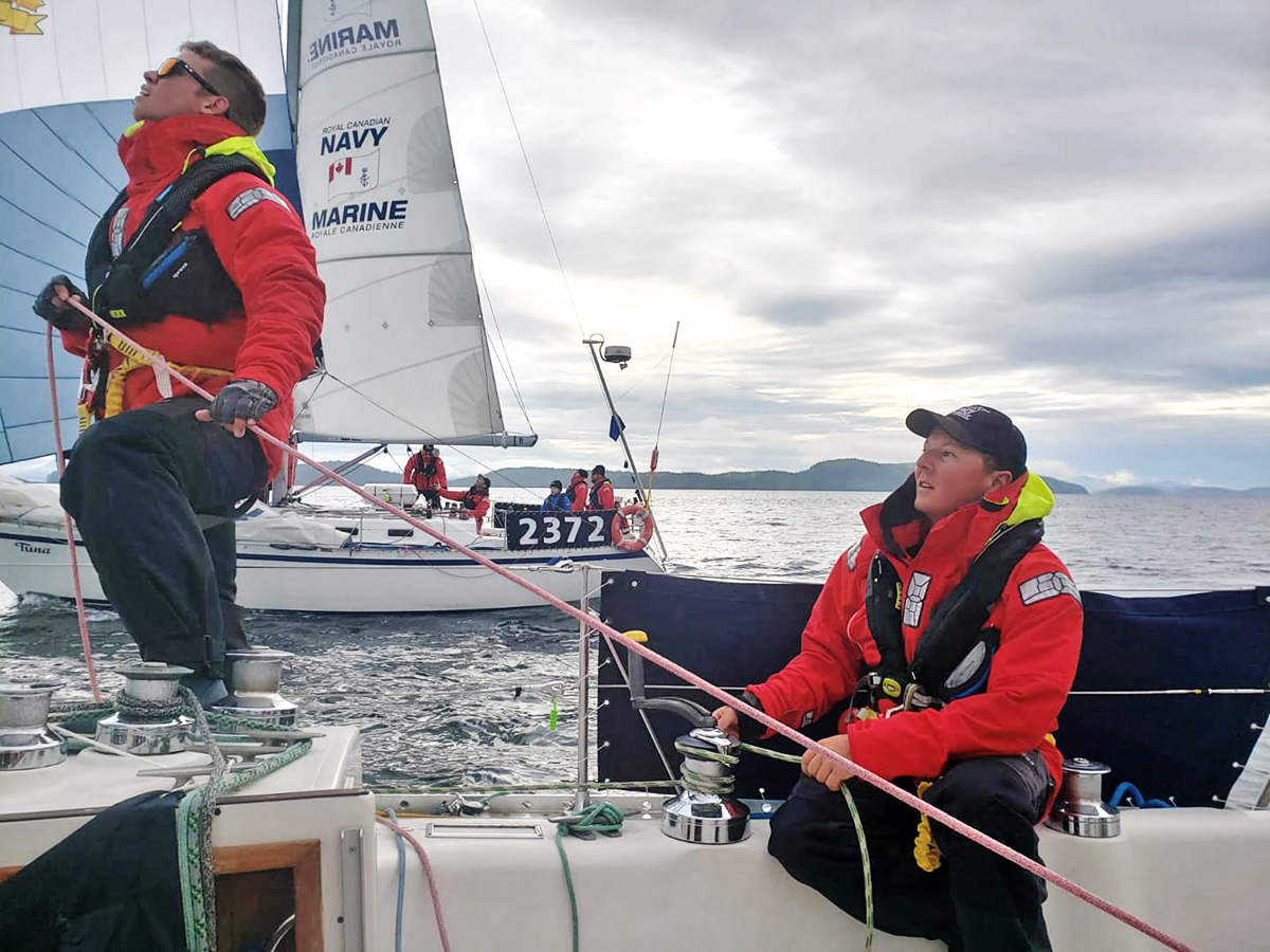 A/SLt Hayden Pooley and Lt(N) Tom Eagle of STV Goldcrest neck and neck with STV Tuna in a downwind Spinnaker race to Port Hardy during the Van Isle 360 Yacht Race. Photo by LCdr Chris Maier