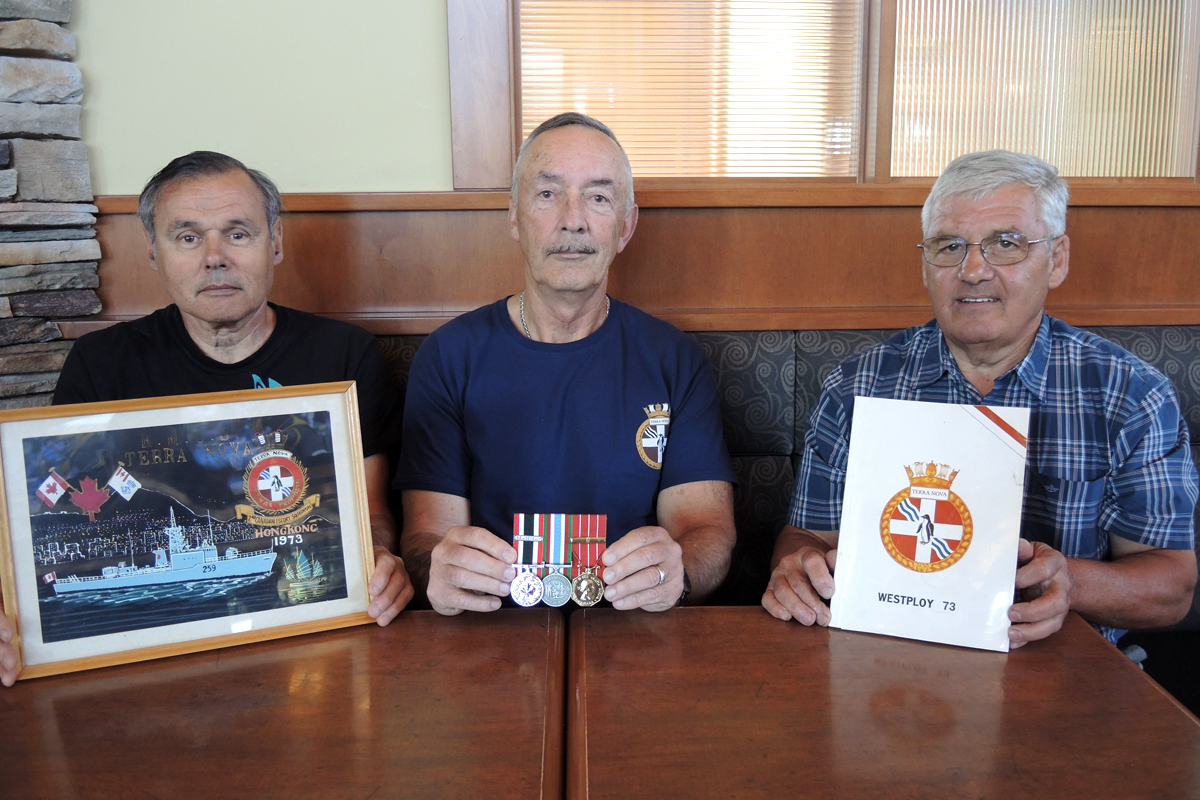 From left: Lt(N) (Retired) André Robin, CPO2 (Retired) Ken Levert and CPO2 (Retired) Claude Jolivet reminisce about old times back in 1973 when they were aboard HMCS Terra Nova during Canada’s peacekeeping mission in the Vietnam conflict. Photo by Peter Mallett, Lookout