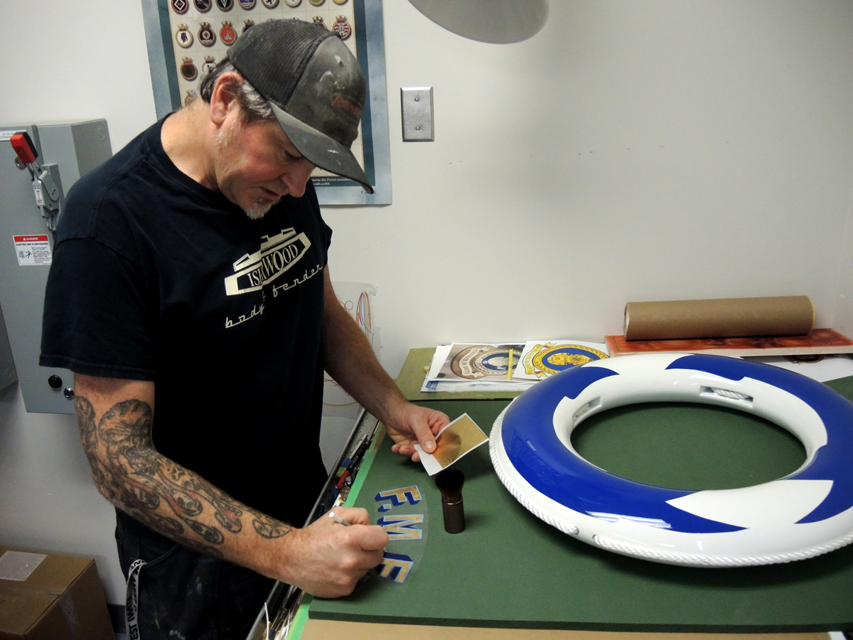 Ryan Yeomans works on a Kisbee ring in his Fleet Maintenance Facility work shop. Photo by Peter Mallett, Lookout