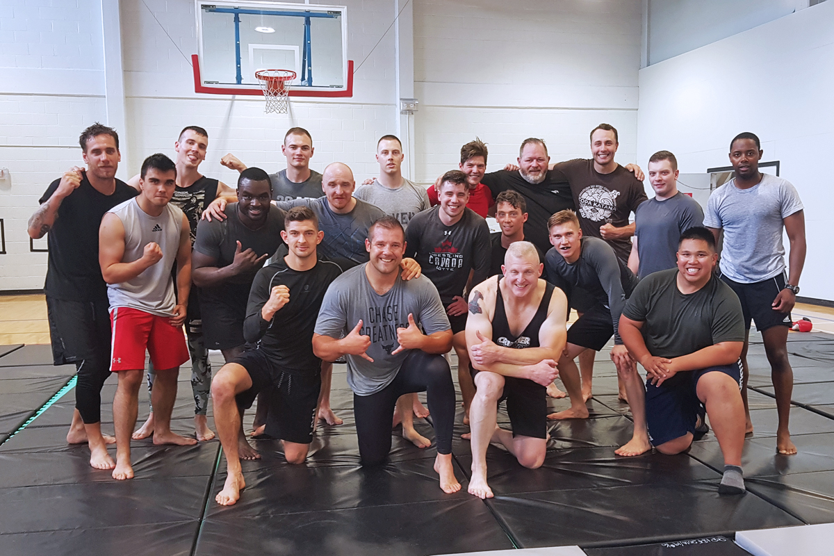 Members of the Naden Grappling Club pose for a group photo during a recent training session at the Naden Athletic Centre.