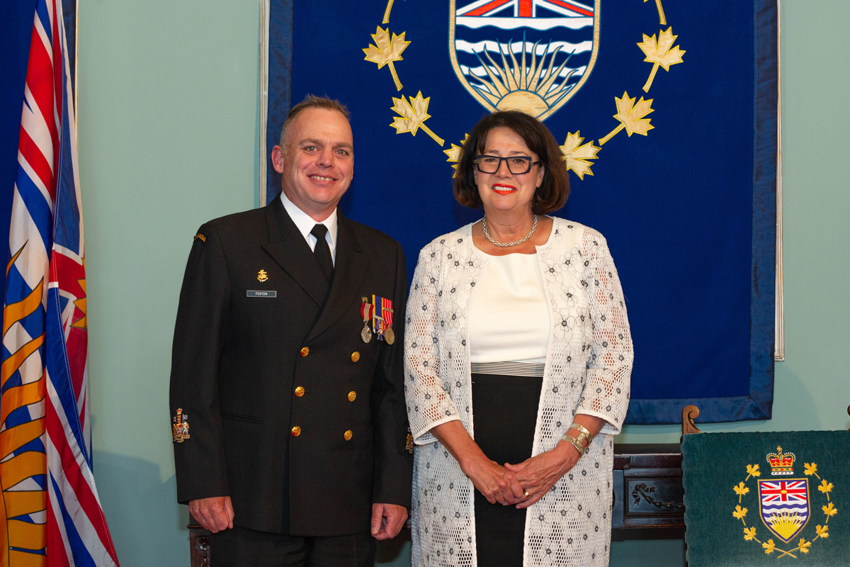 CPO1 Paul Fenton receives the Sovereign’s Medal for Volunteers from Her Honour, the Honourable Janet Austin, Lieutenant Governor of B.C., in a ceremony at Government House. Photo by LS Shaun Martin, MARPAC Imaging Services