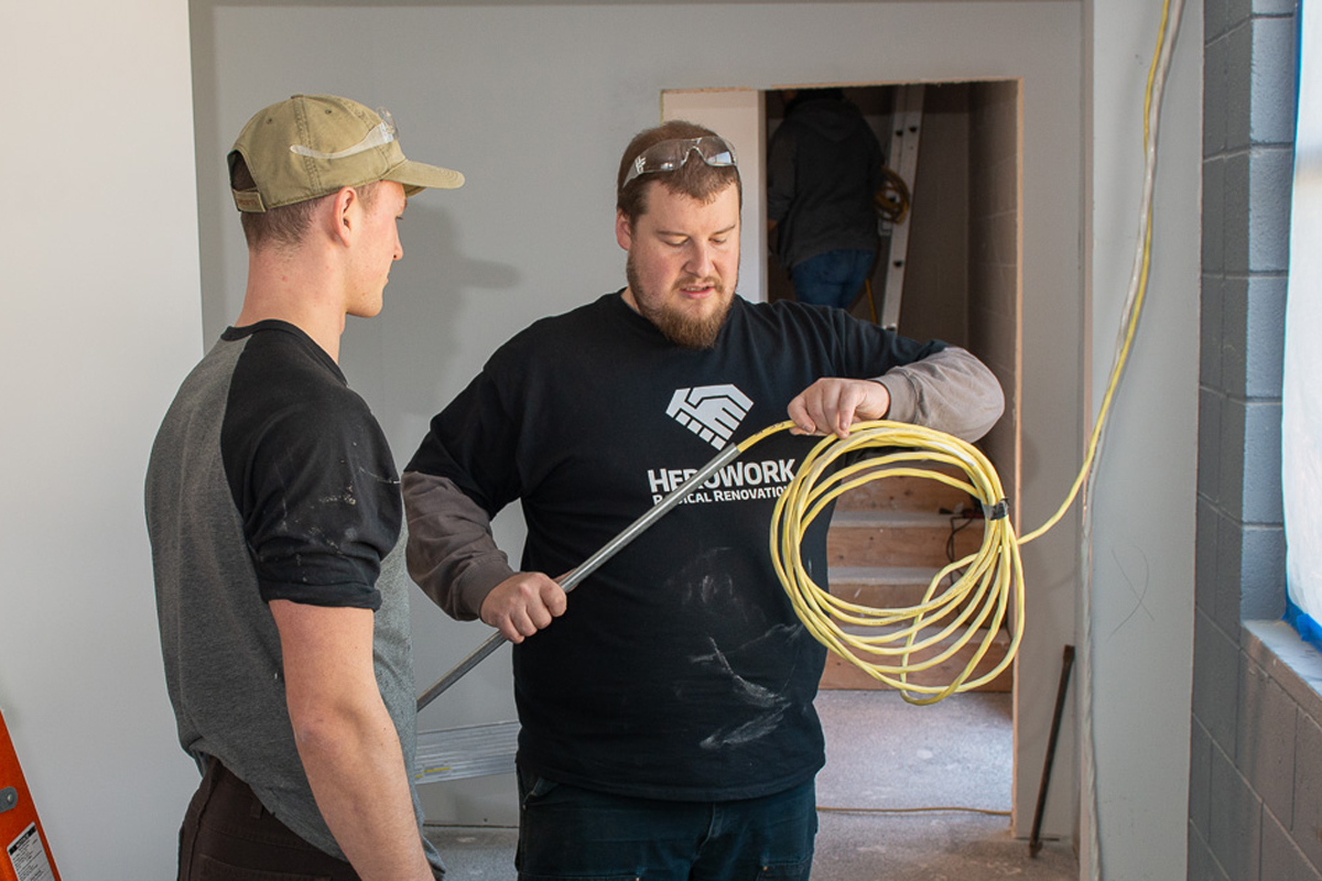 Volunteers from the base and across Victoria pitched in on the latest Radical Renovation on behalf of local charity HeroWork at Peers Victoria Resource Society. Photo by John W.Penner, John’s Photography