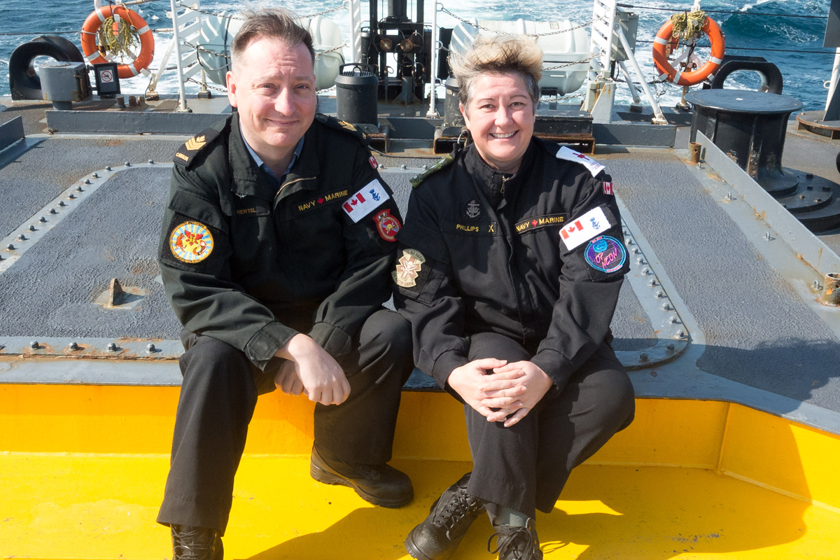 Siblings PO2 Thomas Hertel and Capt Monica Phillips on HMCS Ottawa’s quarterdeck. Photo by Capt Jen Jackson, HMCS Ottawa PAO