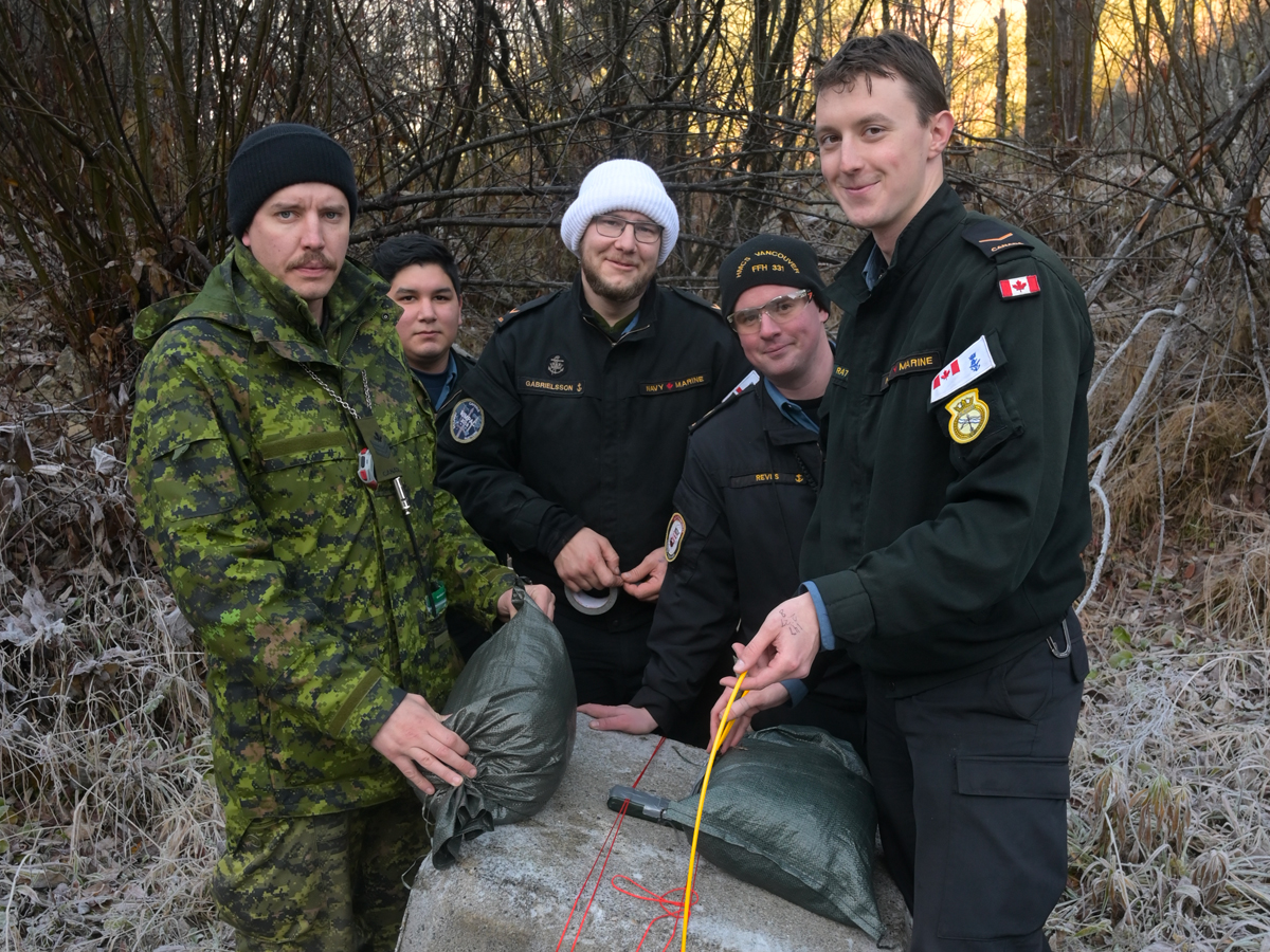 Petty Officer Second Class Jason Boisvenue, Able Seaman Coree Ranville, AB Adam Gabrielsson, Leading Seaman Joshua Reves, and LS Gregory Ratych pose with their project for the demolition phase of their training. Photo by MCpl Carbe Orellana, MARPAC Imaging Services.