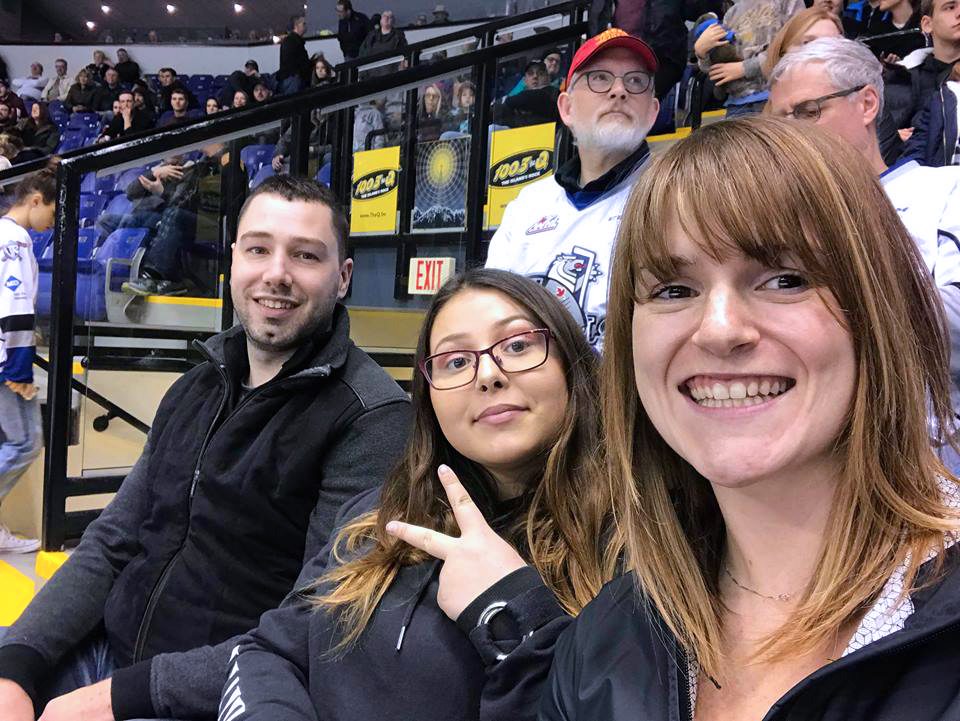 Big Sister LS Marie-Eve Long enjoys a hockey game with her Little Sister and friend MS Dany Nadeau. Photo by LS Mike Golubuff