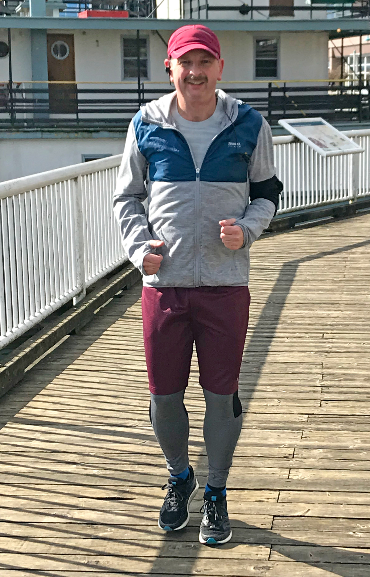 CPO2 Stan Budden’s amazing weight loss is clearly recognizable as he jogs along the New Westminster Quay in Vancouver March 4.