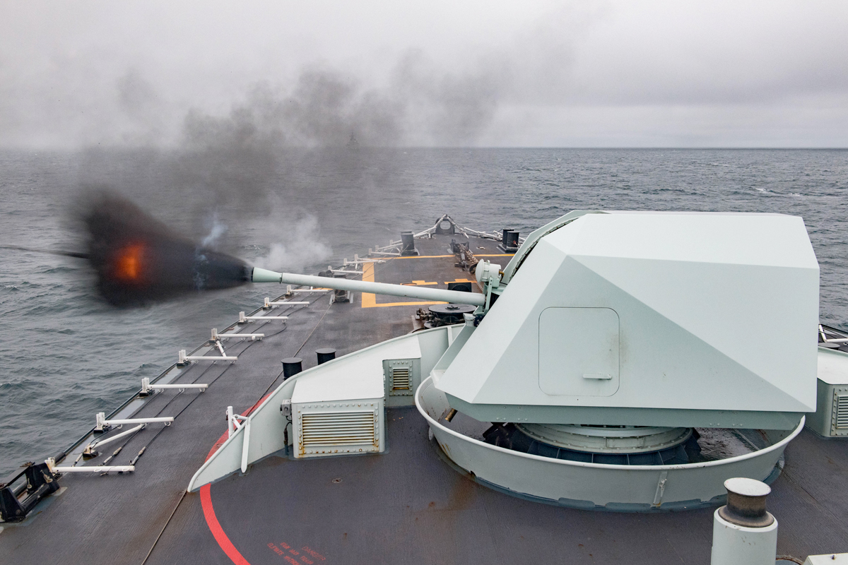 HMCS Calgary conducts a surface firing exercise during the Directed Sea Readiness Training Program off the coast of Vancouver Island March 28.