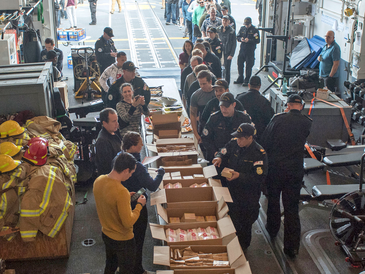 HMCS Calgary crewmembers line up to enjoy some McDonalds food provided by Westshore McDonalds while the ship was alongside F jetty in Colwood on April 30. Photos by Corporal Jay Naples, MARPAC Imaging Services