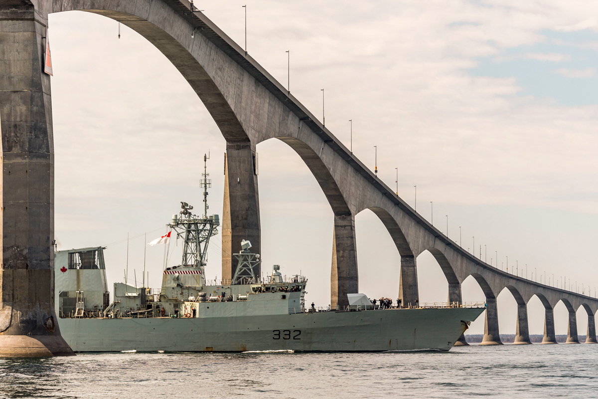 HMCS Ville de Québec sails under the Confederation Bridge between New Brunswick and Prince Edward Island on May 17. Photo by MCpl Anthony Laviolette, CAF Imagery Technician