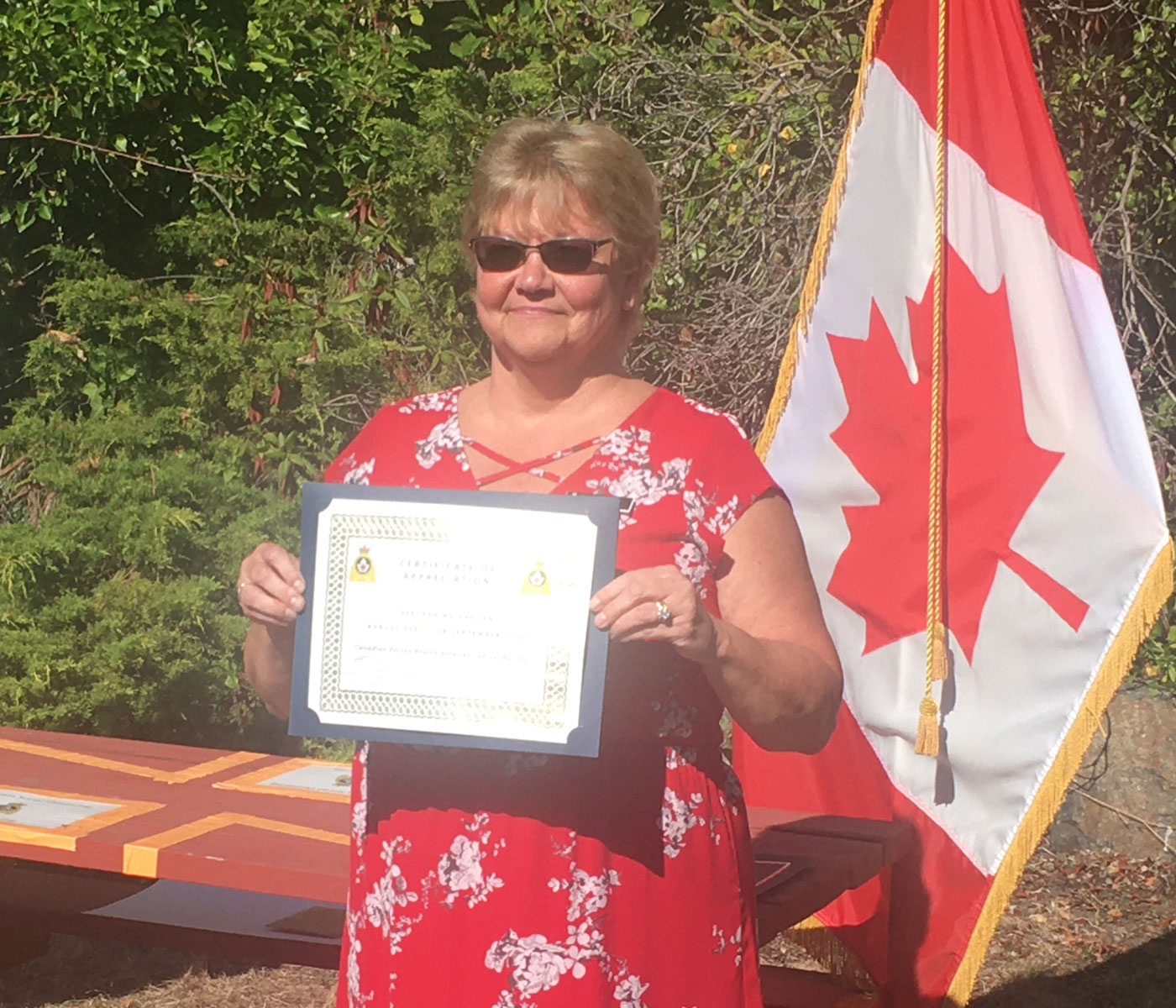Deborah receives a Certificate of Appreciation from Canadian Forces Health Services Command at her retirement ceremony on Sept. 3. Photo credit Dave Yates