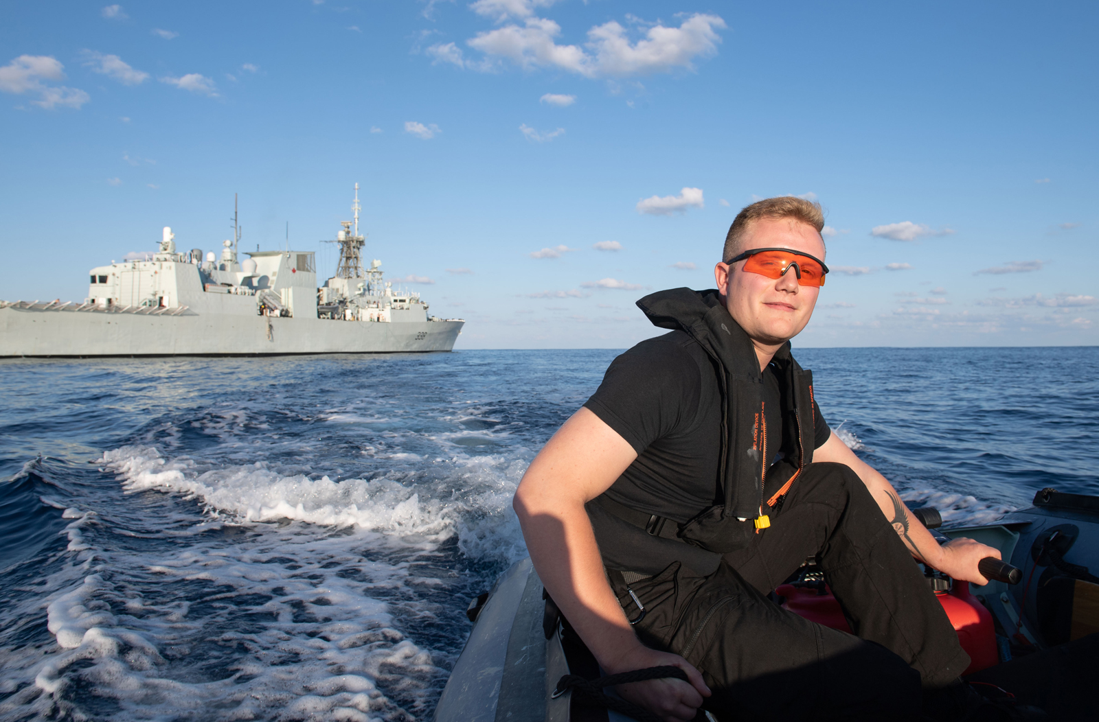S2 Blake Castelein participates in small boat training. Photo by S1 Valerie LeClair, MARPAC Imaging Services