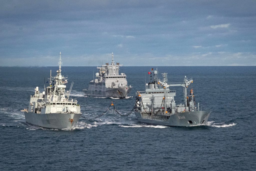 HMCS Halifax, left, the Standing NATO Maritime Group One flagship, conducts task group manoeuvres and a replenishment-at-sea with German Navy warships FGS Spessart and FGS Baden-Württemberg during a Passing Exercise in the North Sea on Jan. 28. FGS Spessart is the German Tanker. Photo by S1 Bryan Underwood, Imagery Technician, Royal Canadian Navy