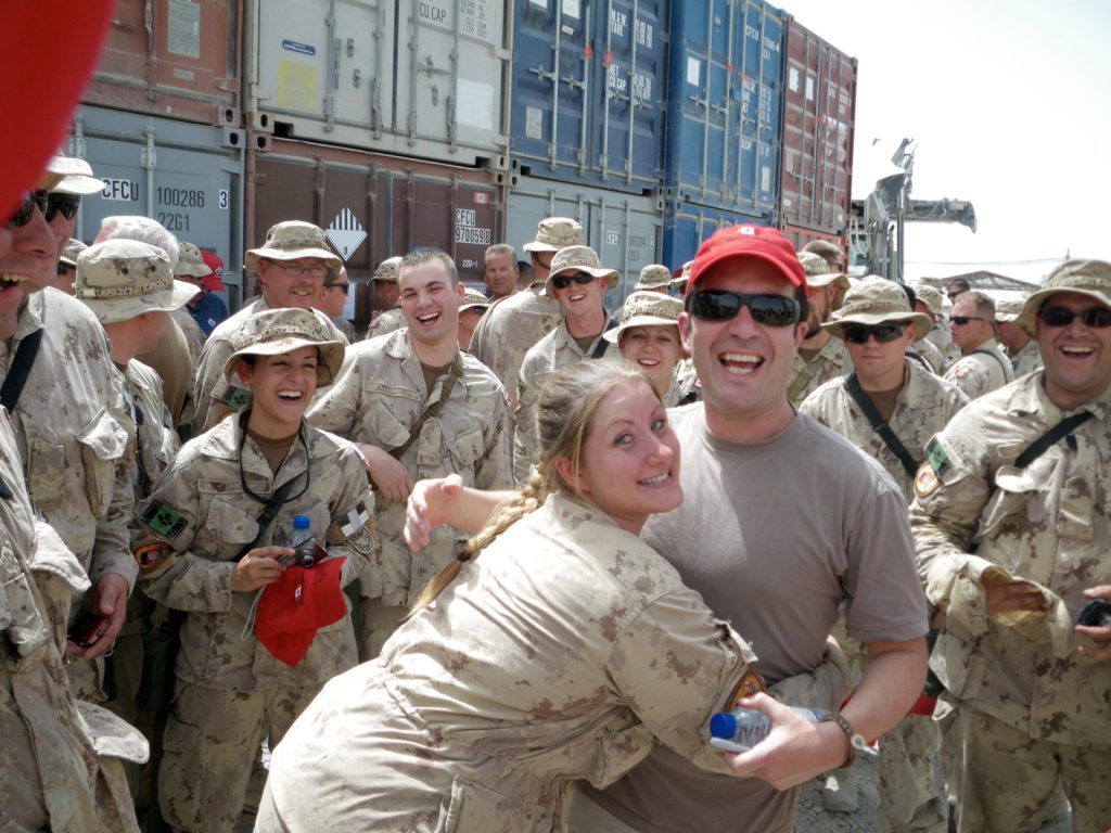 Sgt Allison Geddes hugs TV personality Rick Mercer in Afghanistan where she was part of the Mission Closure Unit. Photo submitted