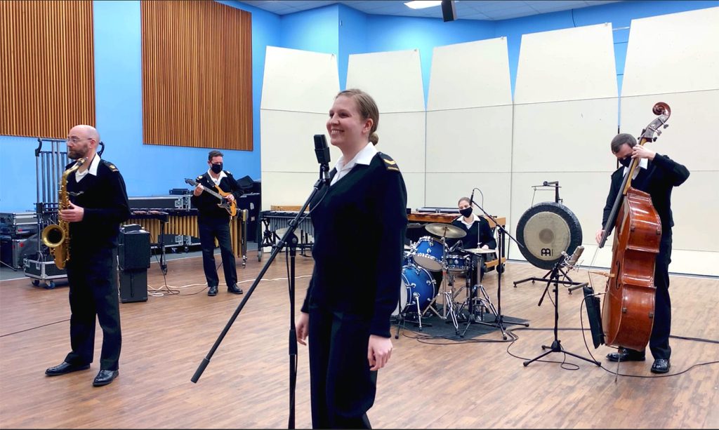 Members of the Naden Band perform the song Hang In There at the Naden Band headquarters. 