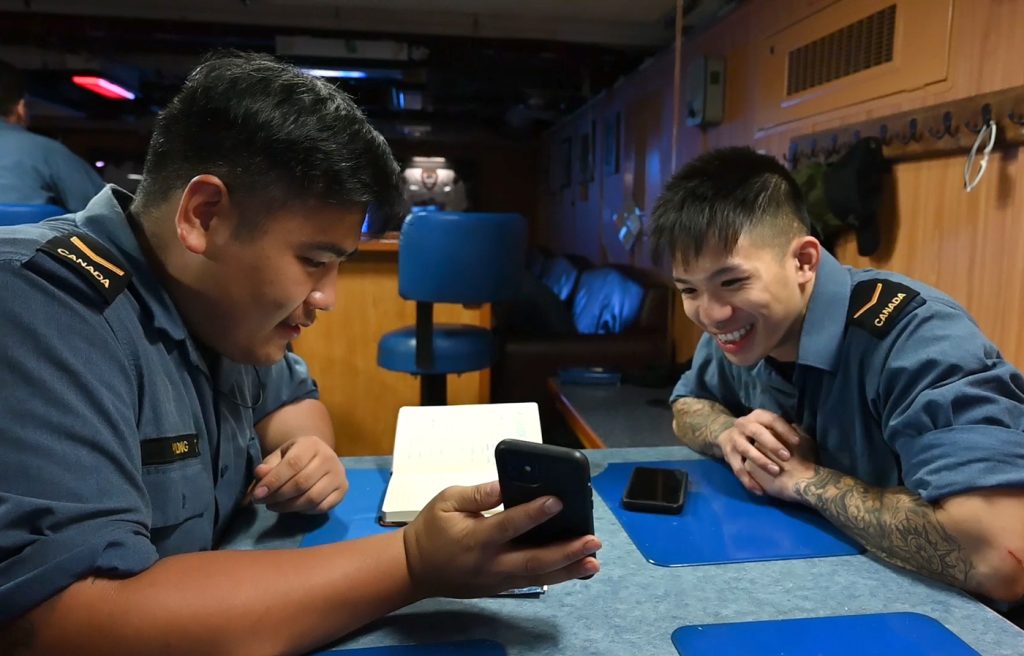 Sailor First Class Richard Vuong (left) and Sailor Second Class Peter Bui were thrilled to visit their homeland of Vietnam as the ship progresses on its Operation Projection / Artemis deployment. Photo by Cpl Lynette Ai Dang, Imagery Technician