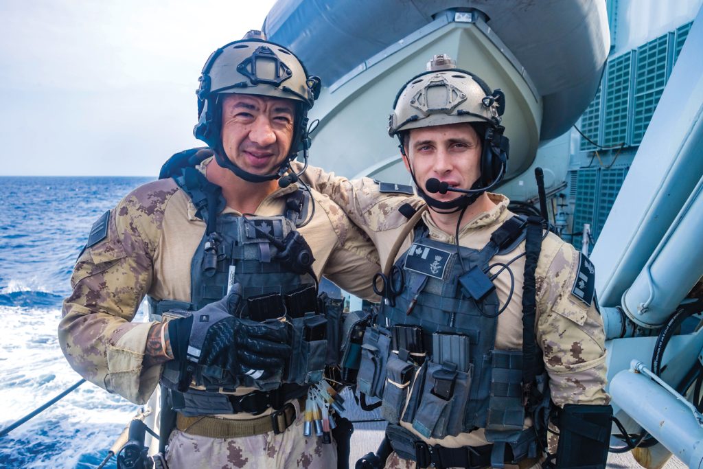 Lieutenant (Navy) Steve Dyck and Petty Officer First Class Ryan Hart on board HMCS Calgary during Operation Projection.