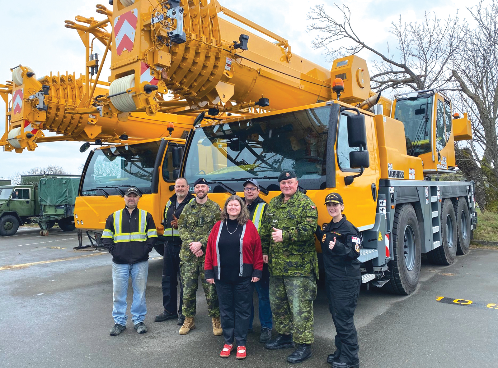 Members of Base Logistics and Transport Electrical and Mechanical Engineering celebrated the arrival of two new 60-tonne cranes to CFB Esquimalt in March 2020.