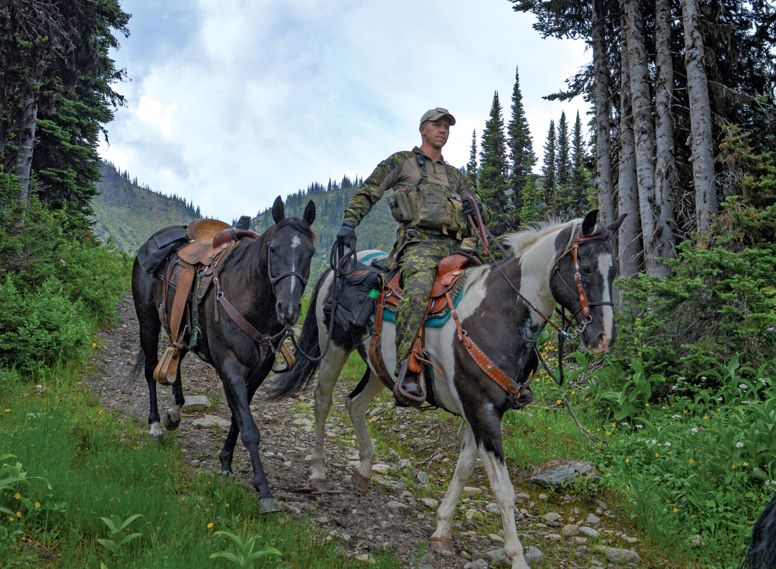 Canadian Ranger Instructor Warrant Officer Kirk McColl rides down from Groundhog Lake with the Quesnel Canadian Ranger Patrol.