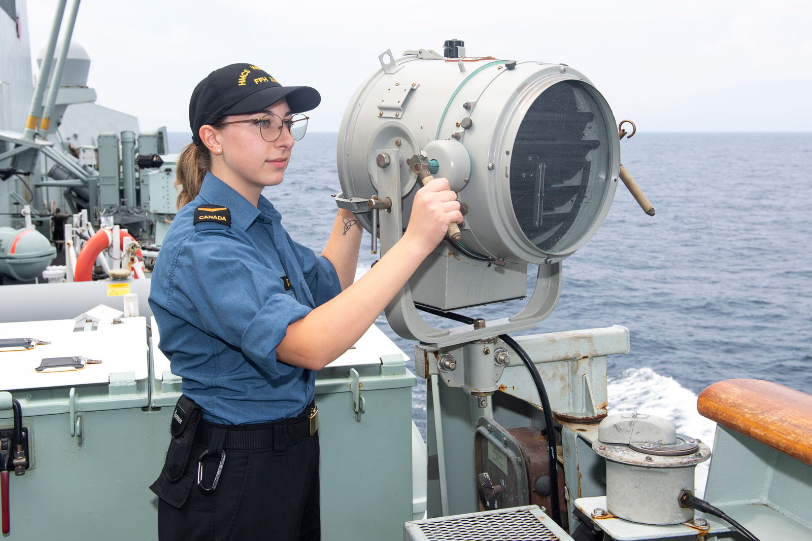 Sailor First Class Hunter Johnson on board HMCS Winnipeg in the East China Sea during Operation Neon. Photo by MCpl Andre Maillet, MARPAC Imaging Services