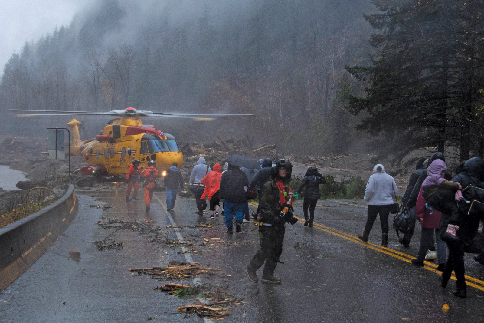 Three Cormorant helicopters and crew from 442 Search and Rescue Squadron evacuated people from Highway 7 after heavy rain triggered mudslides. Photos by Cpl Parker Salustro, Canadian Armed Forces Photos