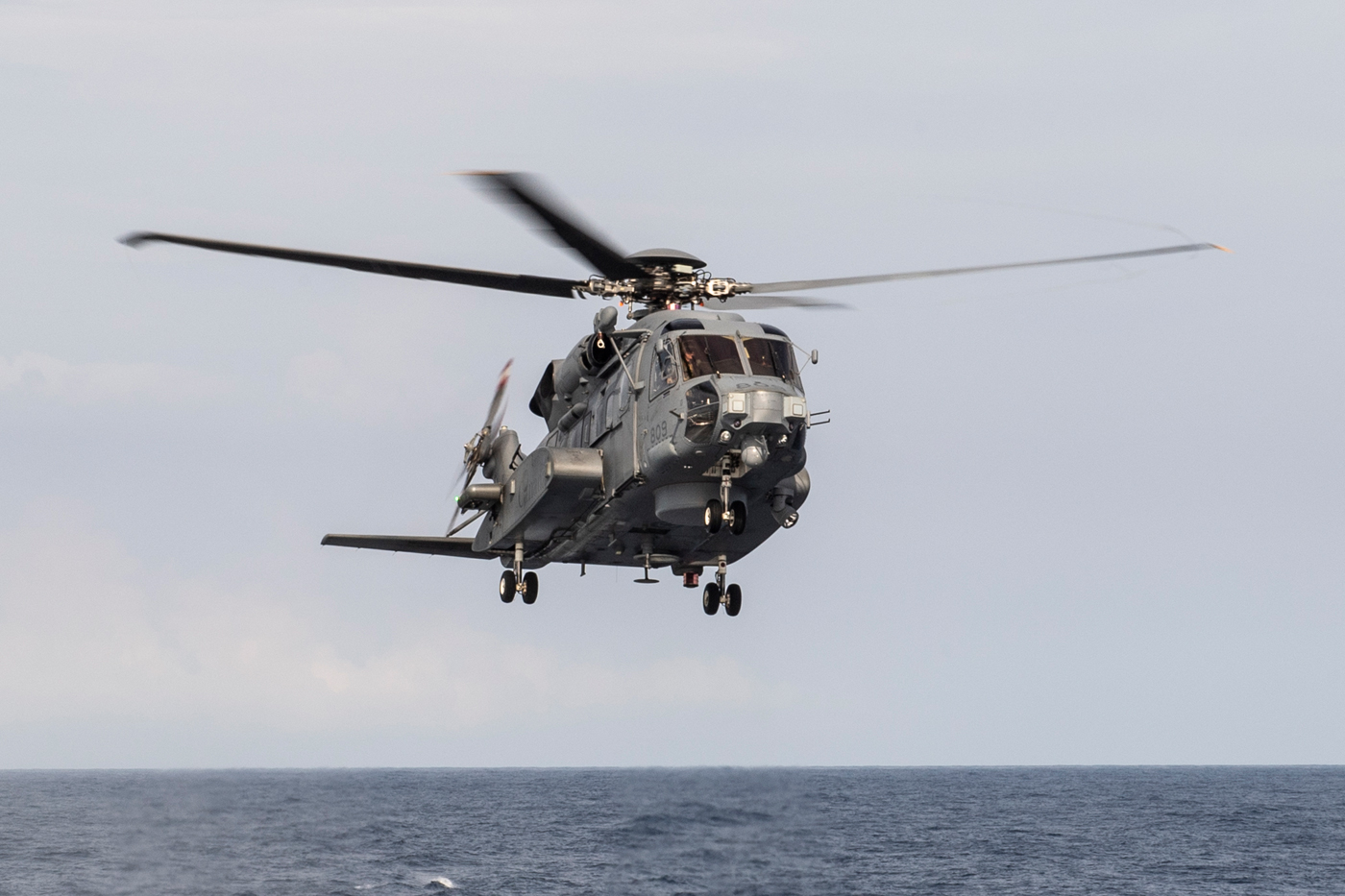 Guardian, Her Majesty's Canadian Ship (HMCS) WINNIPEG, the ship's CH148 Cyclone helicopter, takes off over the Pacific Ocean on September 15 in support of Operation NEON.  Photo by MCpl Andre Maillet, Maritime Forces Pacific Imaging Services