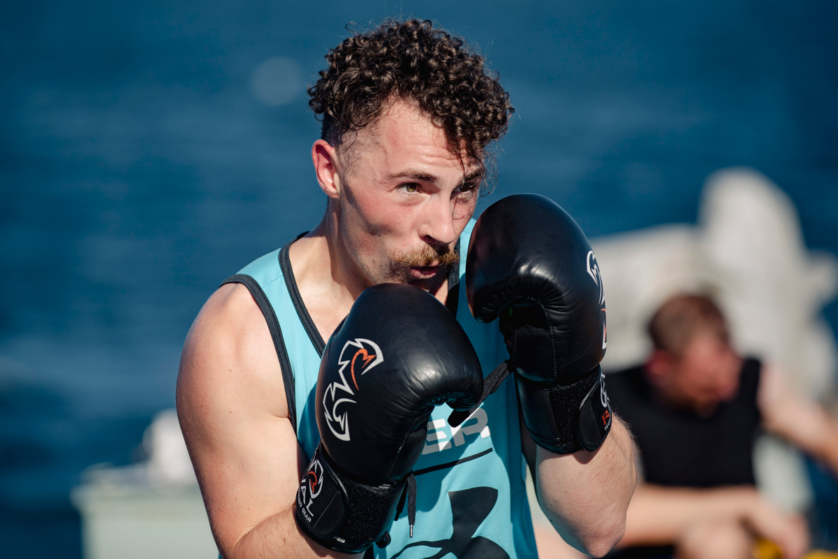 A few members from the HMCS Winnipeg crew practise their boxing skills on the flight deck for physical training.  Photos: Sailor First Class Melissa Gonzalez