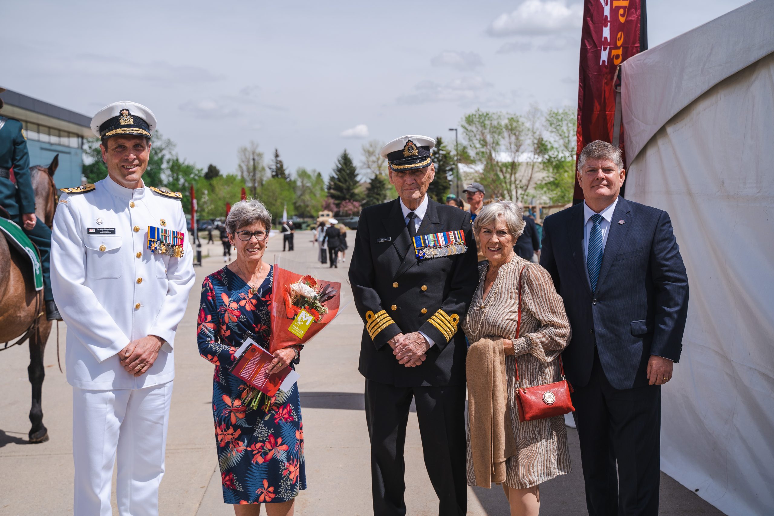Vice-Admiral Angus Topshee, Commander, Royal Canadian Navy; Peggy Sahlen (widow of Paris Sahlen); Captain (Navy) (Retired) William H. Wilson ; Mrs. Wilson; and Ron Hallman, President and Chief Executive Officer, Parks Canada.