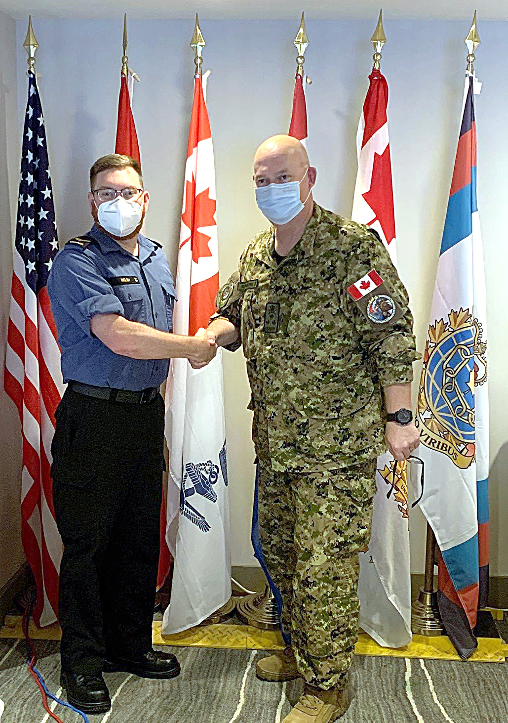 Sailor First Class Jeramie Welsh was presented with a Commander Canadian Joint Operations Command Coin for Excellence during deployment on RIMPAC 22 in Honolulu, Hawaii, by Vice-Admiral Bob Auchterlonie, Commander CJOC.