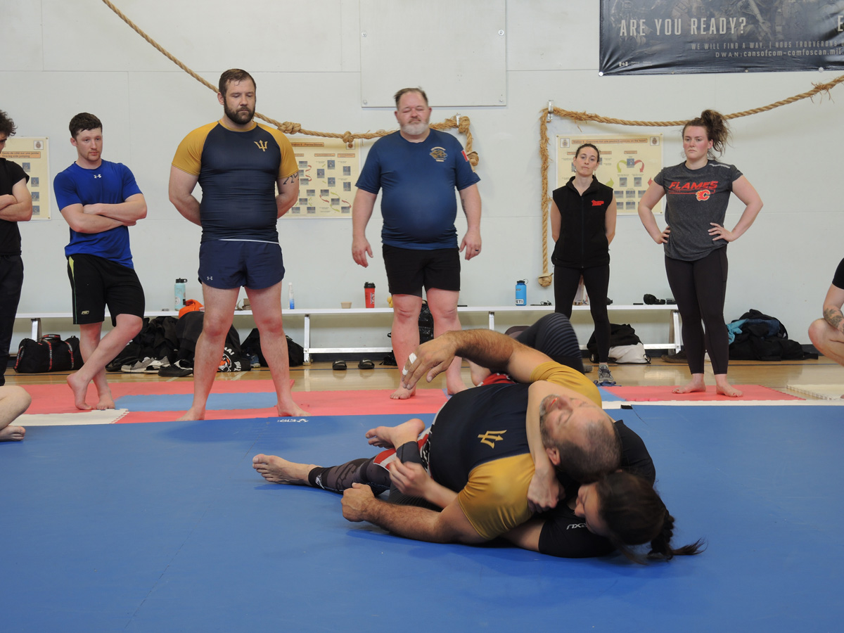 Military members battle for position during a two-day Grappling Camp at the Naden Athletic Centre on March 23. Credit: Peter Mallett/Lookout 