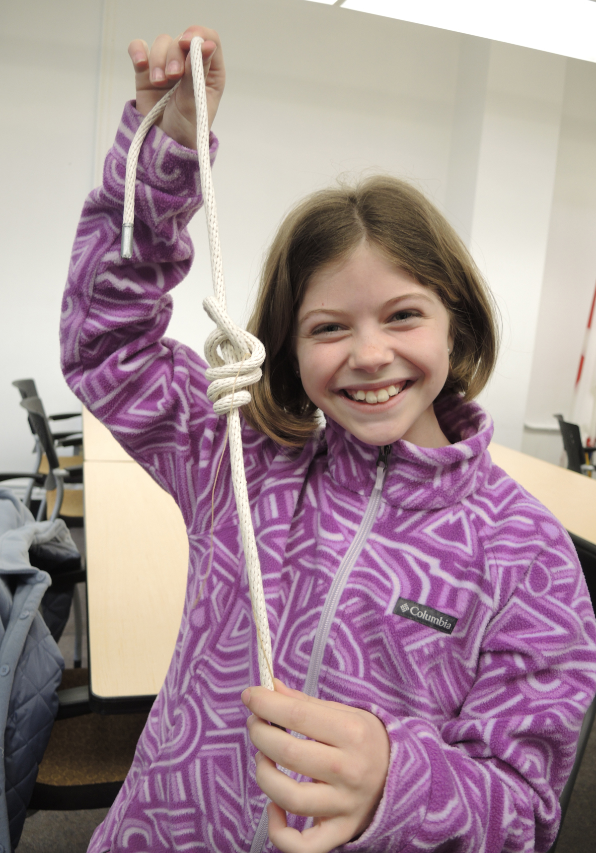 Sophie, a Grade 5 student from Glenlyon Norfolk School, shows off a knot she tied during her visit to Naval Fleet School (Pacific), Apr. 5. Photo: Peter Mallett/Lookout.