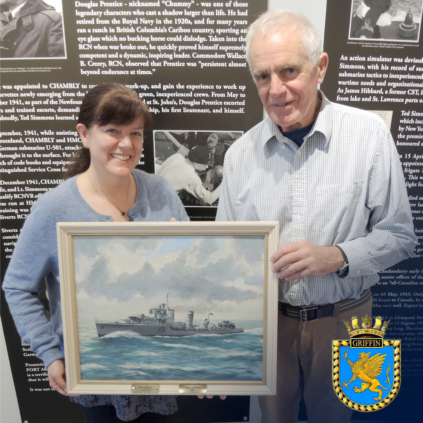 Alan Dennis presents a painting of Royal Navy vessel HMS Griffin to Tatiana Robinson, CFB Esquimalt Naval and Military Museum Curator, Nov. 17. 
Photo: Peter Mallett/Lookout