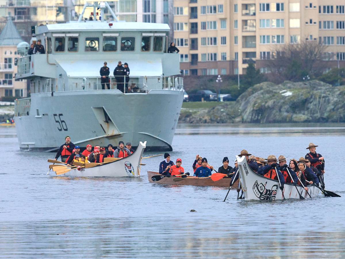 Orca-class training vessel Raven helped escort canoes carrying members of the Songhees and Esquimalt First Nations, Vancouver Canucks Legend Geoff Courtnall and local police services. Photo: Hockey Day in Canada