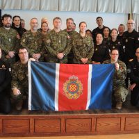 Members of the Base Logistics team gather for a group photograph.