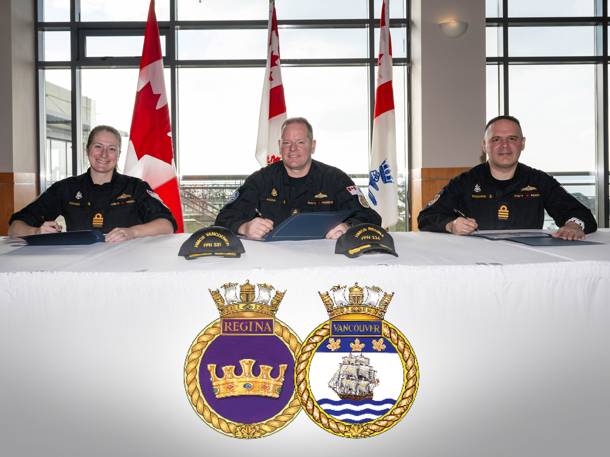 L–R: Commander Coates, Commodore Mazur, and Commander Bergmann signing papers at the Change of Command ceremony held at the Wardroom at Canadan Forces Base Esquimalt on Feb. 7. Photo: Corporal Tristan Walach, MARPAC Imaging Services.