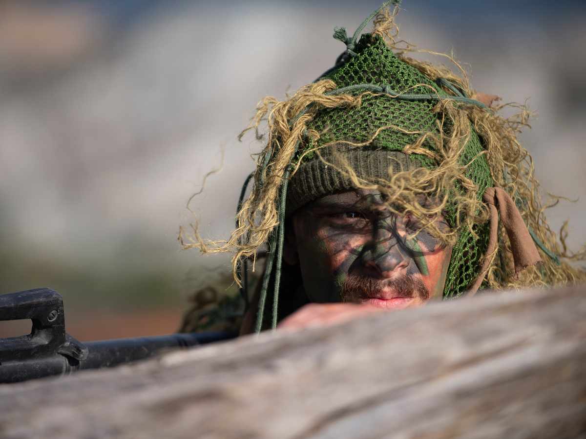 Sapper Carter Marcotte, Canadian Army Combat Engineer, participates in a landing site reconnaissance with NATO Combat Divers. Photo: Master Sailor Valerie LeClair, MARPAC Imaging Services