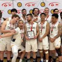 Members of the Esquimalt Tritons men’s basketball team celebrate their 76-44 victory over Cold Lake in the championship game of the Canada West Regional Basketball Championship, Feb. 17 in Moose Jaw, Sask.
