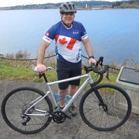Chief Petty Officer 1st Class (CPO1) Paul Fenton of the Personnel Coordination Centre (Pacific) shows off his bike and cycling gear at Duntze Head, April 5. CPO1 Fenton is an ambassador for this year’s Navy Bike Ride, which takes place on May 25. Photo: Peter Mallett, Lookout