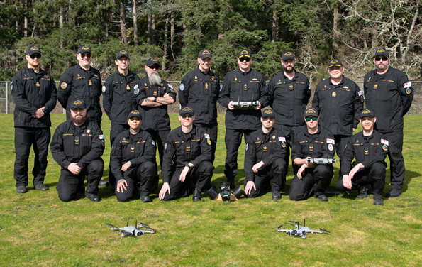 A group photo of the Teal Uncrewed Air System Train the Trainer course. Photo: Corporal (Cpl) Jay Naples, MARPAC Imaging Services.
