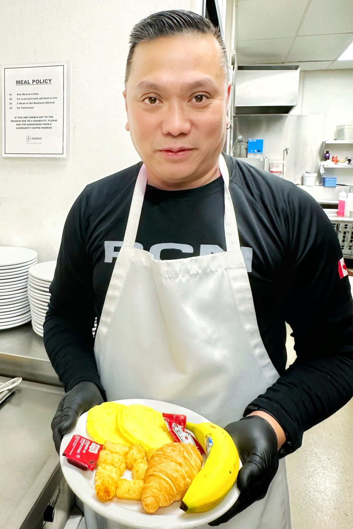 Master Sailor Rommel Billanes, Marine Technician of HMCS Calgary, proudly presents a nutritious and delicious breakfast for the residents of Our Place Society. Photos supplied
