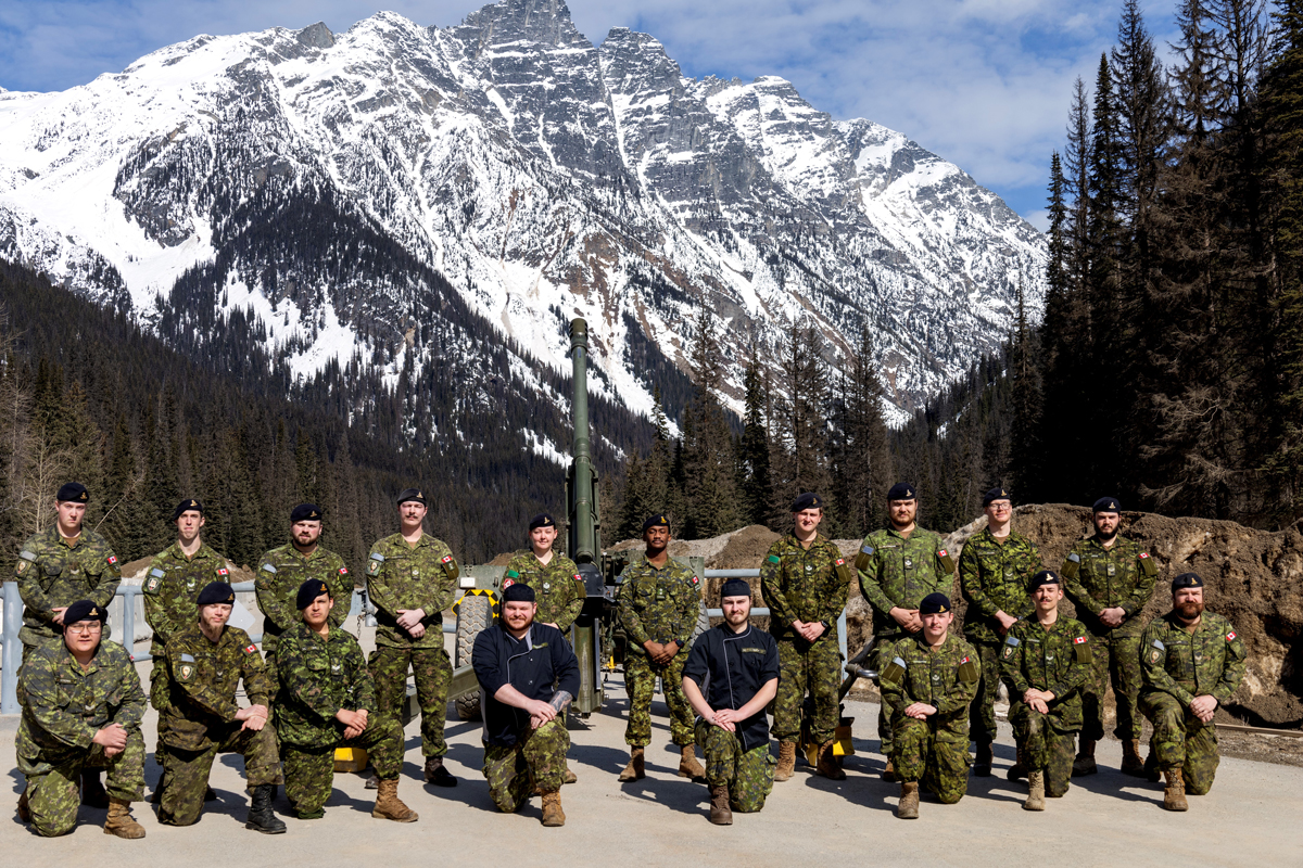 Second roto of Op Palaci members at Rogers Pass on March 24. Back, left to right: Bombardier (Bdr) Lelond, Bdr Berry, Master Bombardier (MBdr) Workman-Turgeon, MBdr Fingarsen, Sergeant Lewis, Lieutenant Mensah, MBdr Gaudet, Gunner Nalder, Bdr Dickie. Front, left to right: Bdr Strong, Bdr Maly, Bdr Bird, Master Corporal Trudel, Corporal Smith, MBdr Ferguson, Bdr Lalonde, Bdr Lipp. Photo: Dan Hudson, Parks Canada 
