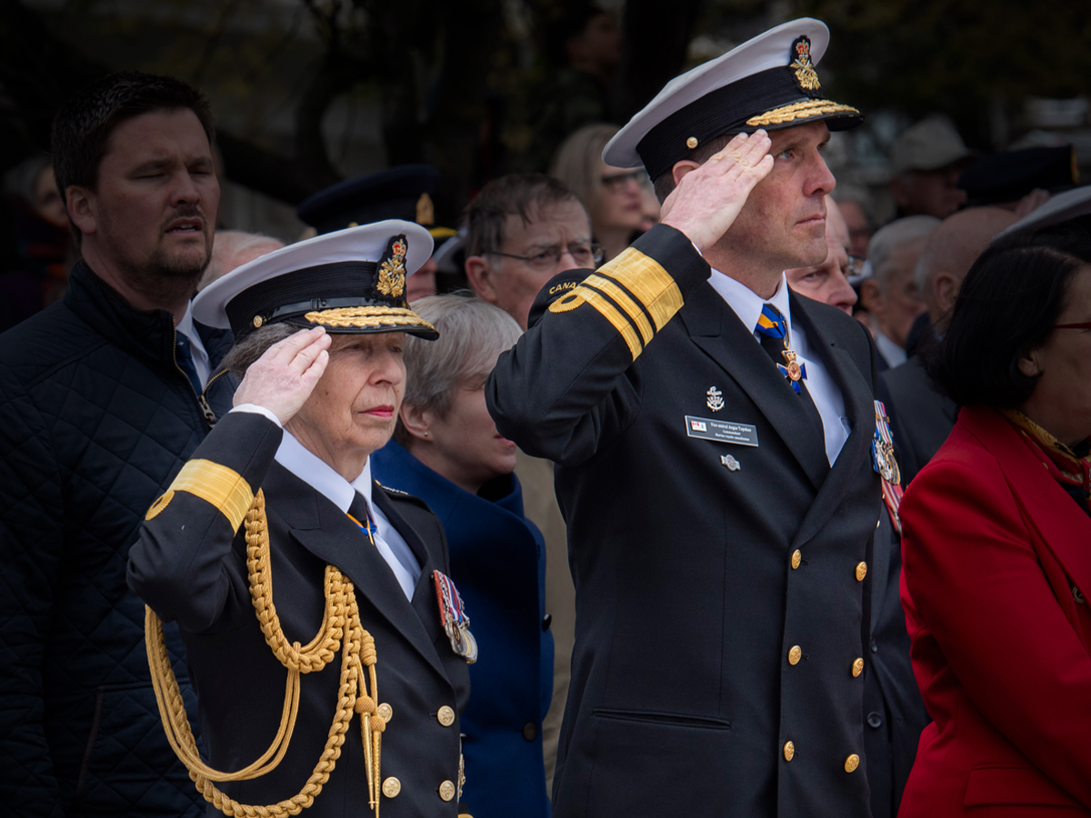 Her Royal Highness, Princess Anne, The Princess Royal, Honourary Commodore-in-Chief of Canadian Fleet Pacific (left), and Vice-Admiral Angus Topshee, Commander of the Royal Canadian Navy, salute at the British Columbia Legislature Cenotaph during the Battle of the Atlantic Parade on May 5. Photo: Sailor 3rd Class Mckayla Ryce, MARPAC Imaging Services