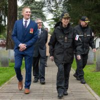 Her Royal Highness tours the grounds of God’s Acre Military Cemetery in Esquimalt with Commodore David Mazur (right), Commander Canadian Fleet Pacific, and a member of Veteran Affairs Canada. Photo: Corporal Jay Naples.