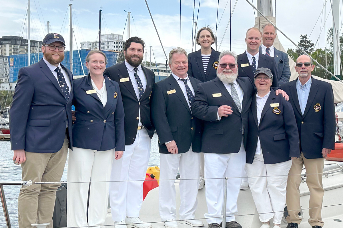 CFSA leadership past and present gather for a group photo on the jetty. (Top Row from Left) Ginette Gibeault, Membership Chair, Kurtis Paddle, Rear Commodore, Bjarne Hansen, Foreshore Team Lead. (Bottom Row) Brendan Carver, Treasurer, Bethany Devlin, Entertainment Chair, Master Sailor Ben Sproule, Commodore, Ray Weisgerber, Communications Chair, Chief Petty Officer 2nd Class (ret’d) David Mitchell, Past Commodore, Leslie Basham, Fleet Captain, Barry White, Small Boats Chair.