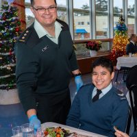 Captain Simpson serves Corporal Lacadin as the salads come out for all of the junior members. Photos: Master Warrant Officer Samantha Crowe